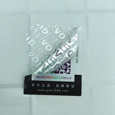 防伪瓶口贴是贴在瓶类包装开口处的一次性标签
